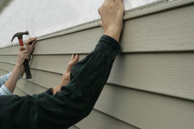 Local Garage Siding Installation pros at work